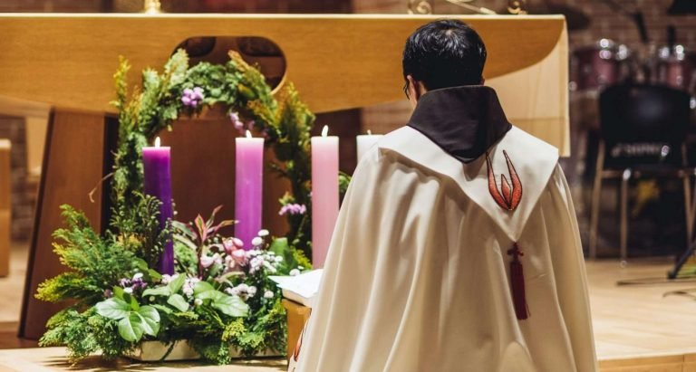 Why do Catholics bow at the Name of Jesus?