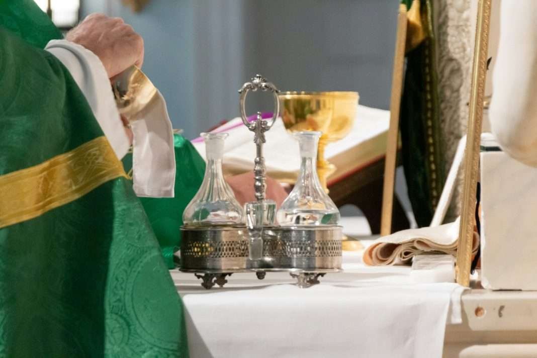 May I use a regular bottle for storing holy water?